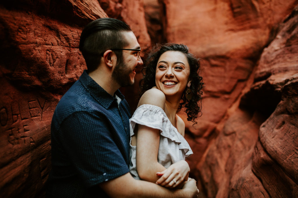 engaged couple in red rock canyon