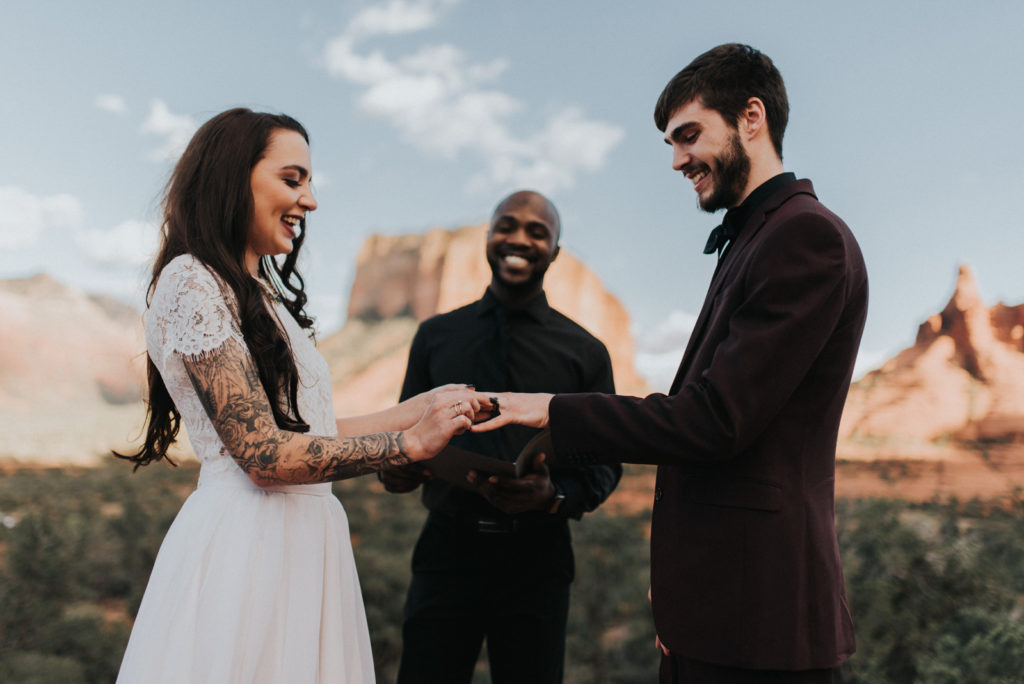 Bride and groom exchanging vows in Sedona