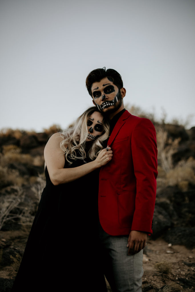 Couple with skeleton makeup for a Halloween styled shoot