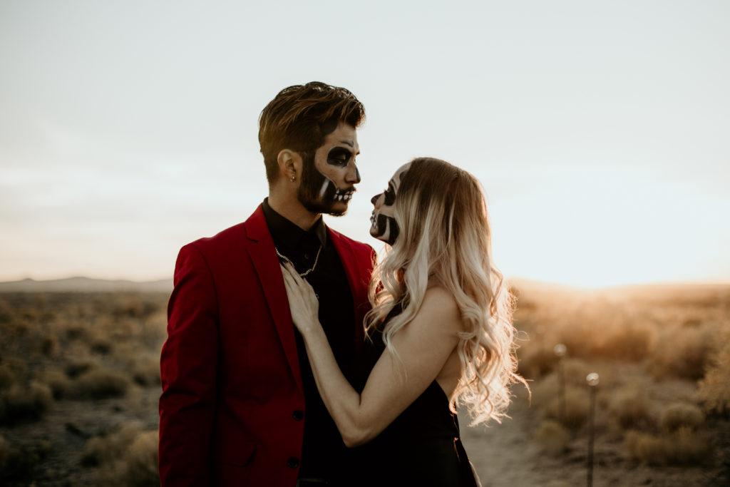 Couple with skeleton makeup for a Halloween elopement styled shoot