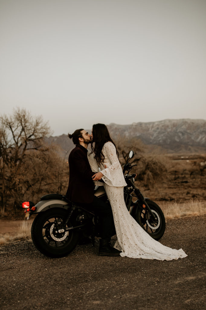 bride and groom sitting on a motorcycle