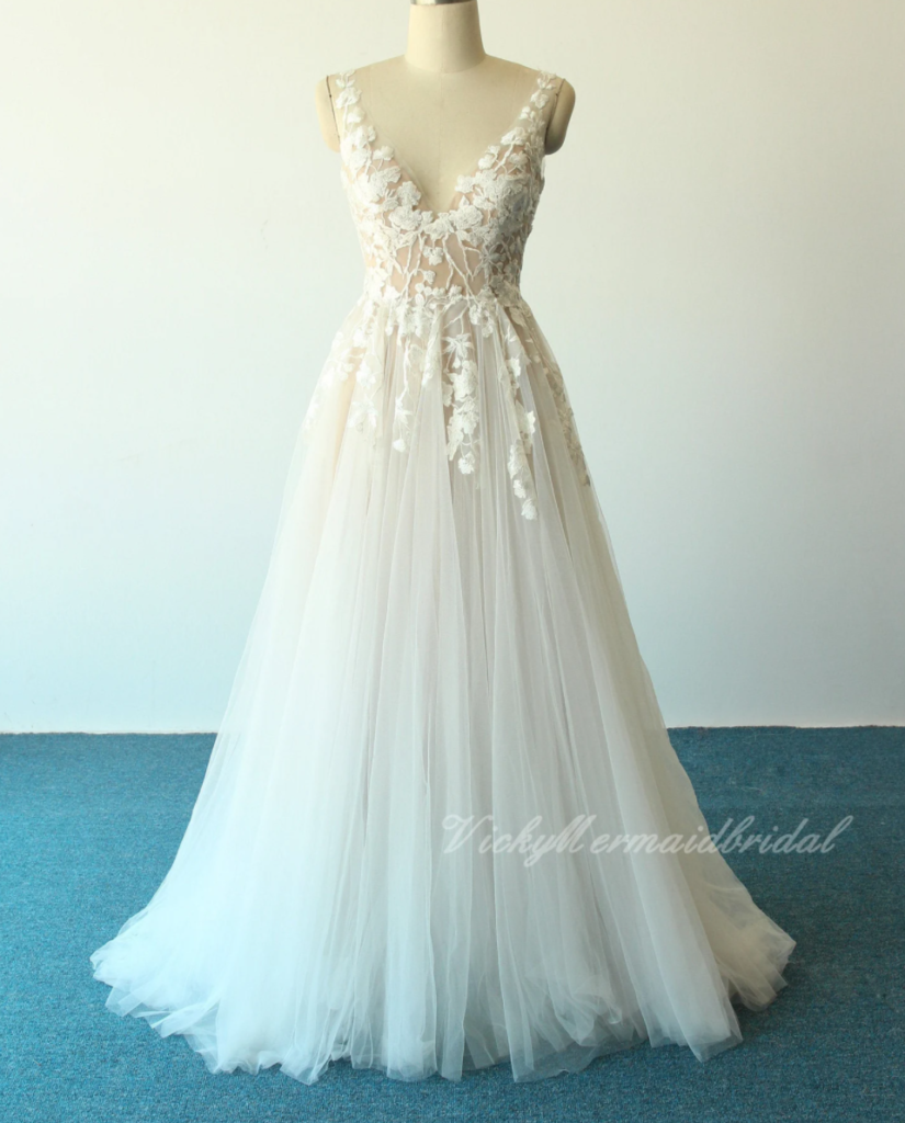 a line tulle dress on mannequin 
